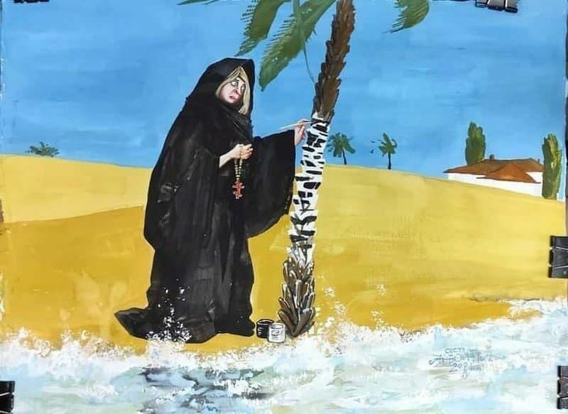 Между тем, в социальных сетях распространяется карикатура, на которой Поклонская с распятием в руке перекрашивает кабовердианскую пальму в русскую березку 